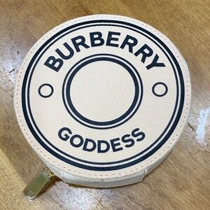 NWOT.  Burberry, small makeup bag.